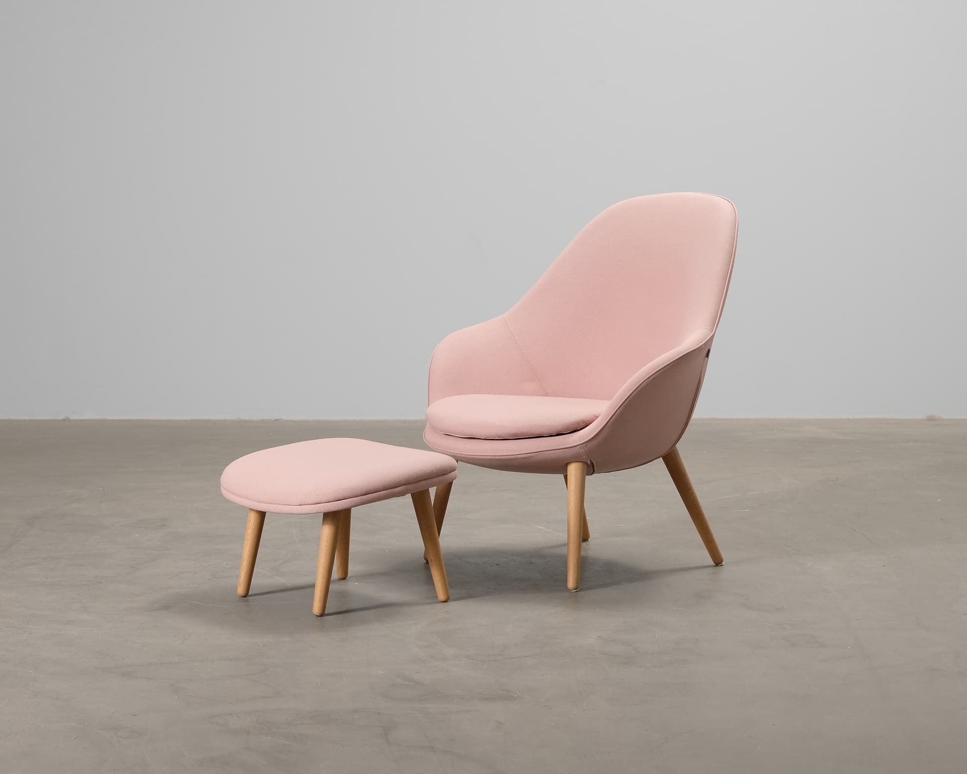 BoConcept Adelaide fåtölj med fotpall rosa